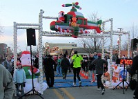 Race Photo  The 2009 running of the Holiday Hustle 5K put on by Running Fit in Dexter Michigan on a sunny but 28 degree on December 5, 2009. : 5K, Fitness, Race, Running, Kasdorf